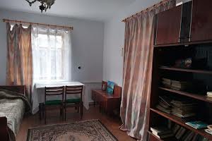дом по адресу  ул.