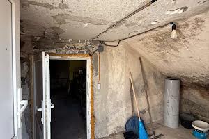 будинок за адресою с. Драгомирчани, Миру, 4