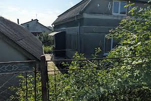 будинок за адресою Рогатин, Могили, 38
