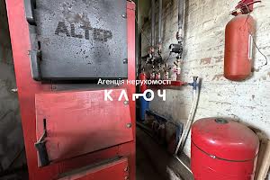 комерційна за адресою Олега Ольжича вул., 48А