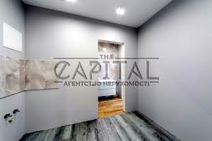 комерційна за адресою Метрологічна вул., 58