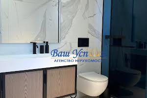 будинок за адресою Набережна вул., 77
