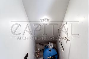 дом по адресу с. Петропавловская борщаговка, Центральная ул., 1