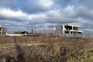 участок по адресу Лесі Українки