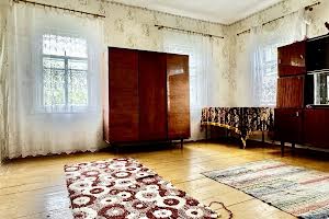 будинок за адресою смт. Ріпки, Набережна вул., 40