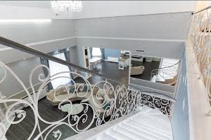 будинок за адресою Уютна, 8