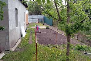 участок по адресу Мельниківська