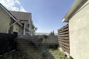 будинок за адресою с. Нові Петрівці, Канівська вул., 37а
