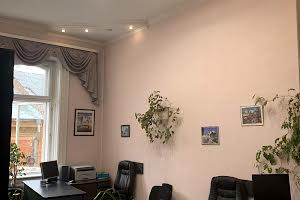 комерційна за адресою Товстого вул., 7