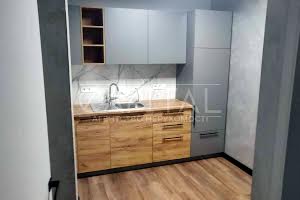 комерційна за адресою Костянтинівська вул., 75