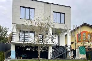 будинок за адресою Листопадна вул., 1