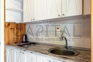 комерційна за адресою Жовтнева вул., 34