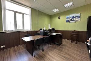 комерційна за адресою Олега Ольжича вул., 1