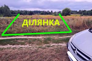 участок по адресу Приморська