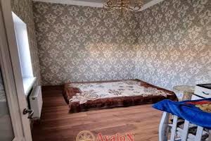 будинок за адресою Жоліо Кюрі вул., 8