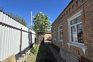 дом по адресу Юрия Бутусова ул. (Панфіловців), 1