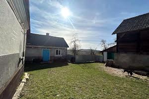 будинок за адресою с. Жолоби, Польова