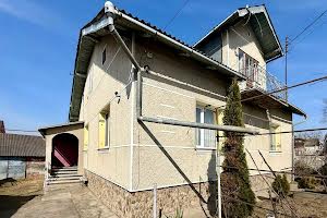 будинок за адресою с. Драгомирчани, Миру, 4