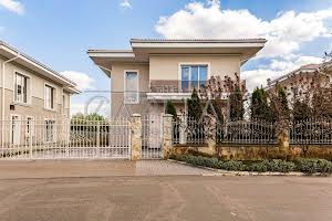 дом по адресу Квітуча