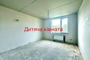 будинок за адресою с. Рожни, Пухівська