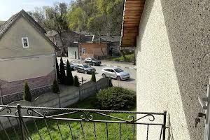 дом по адресу Коновальця