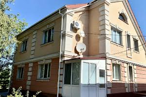 будинок за адресою вул.Грушевського
