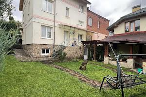 будинок за адресою Академіка Степана Рудницького вул.