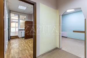 комерційна за адресою Євгена Коновальця вул. (Щорса), 32-Б
