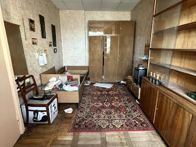 квартира за адресою Куликівський узвіз (Революції), 8/10