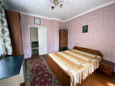 будинок за адресою Комарова вул., 25