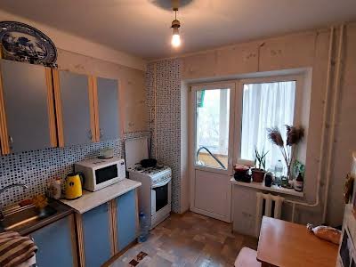 квартира за адресою Євгена Коновальця вул. (Щорса), 37