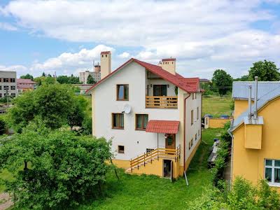 будинок за адресою с. Оброшине, Самбірська, 11