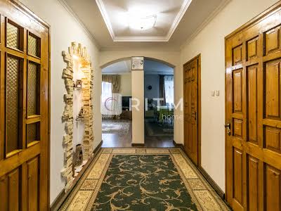 будинок за адресою Євгена Коновальця вул., 287