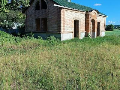 будинок за адресою с. Томилівка, Центральна