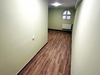 дом по адресу Кобилянської