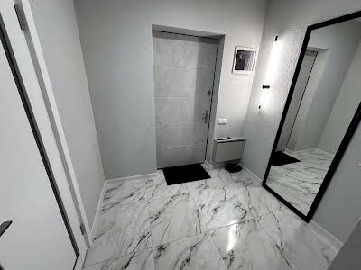 квартира за адресою смт. Слобожанське, Співдружності вул., 5