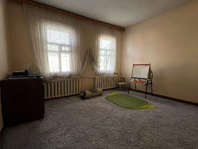 будинок за адресою Іоанна Максимовича вул. (Островського), 18
