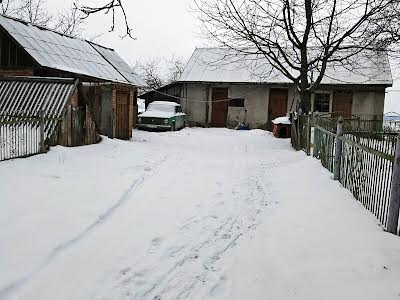 будинок за адресою с. Давидківці, Центральна