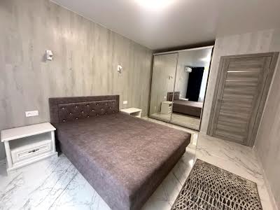 квартира за адресою смт. Слобожанське, Сімейна вул., 5