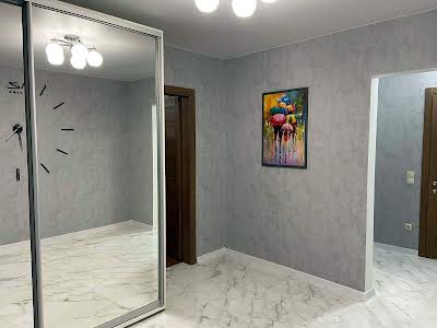 квартира за адресою Ревуцького вул., 54