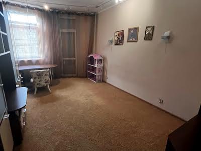 квартира за адресою Євгена Коновальця вул. (Щорса), 36-Б
