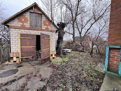 дом по адресу с. Червоная Знаменка, Молодогвардійська