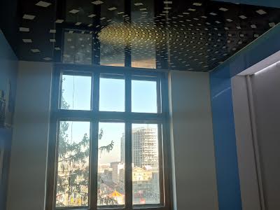 комерційна за адресою по Яворницького, 65