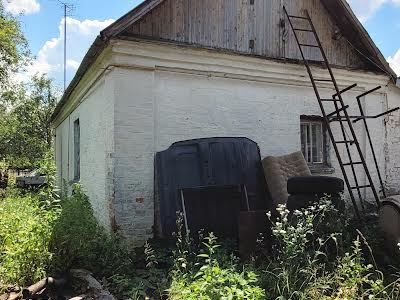 дом по адресу с. Тетеревка, Партизанська, 2