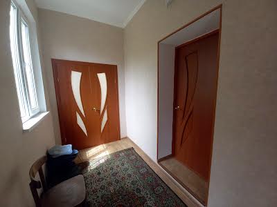 будинок за адресою с. Молодіжне, 22 лінія, 1