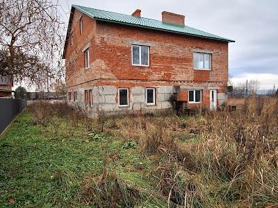 будинок за адресою Українки Лесі, 100