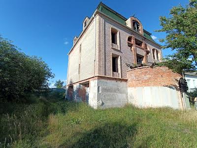 будинок за адресою с. Томилівка, Центральна