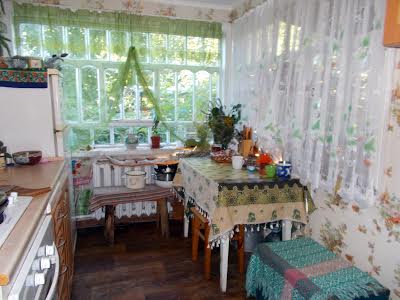 будинок за адресою Миколи Василенка вул. (Будьонного пров.), 38
