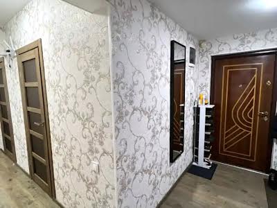 квартира за адресою смт. Слобожанське, Слобожанська вул. (8 Березня), 9