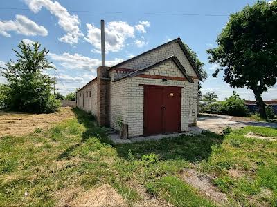 коммерческая по адресу пгт. Новая Водолага, Грушевського, 1